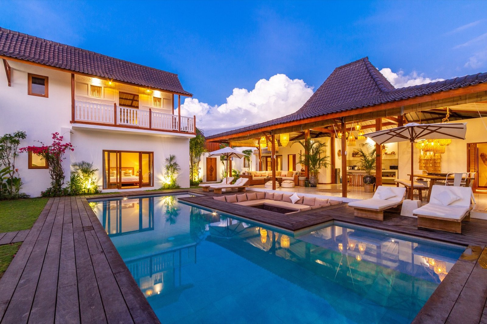 Tiga Boutique Hotel pool at dusk surrounded by tropical gardens